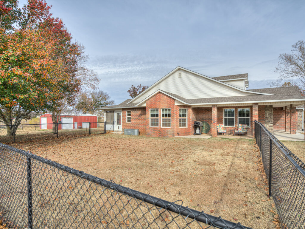 Chain Link Doggy Yard of Side of House