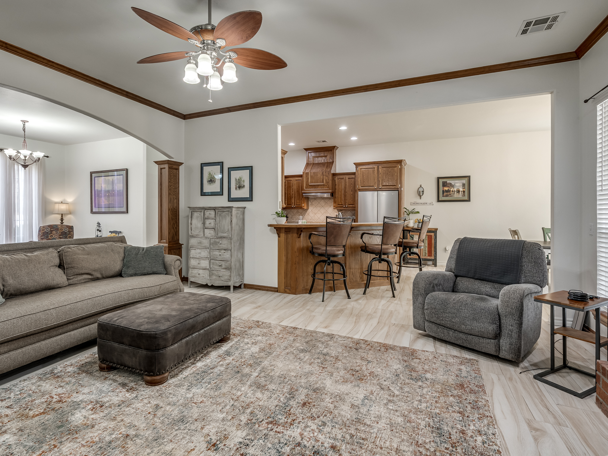 View in Living Room towards the Sitting and Open Kitchen area