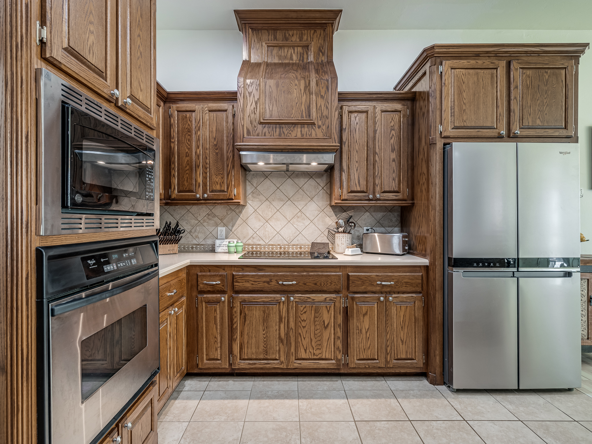 Stainless Steel Appliances and Oak Cabinets