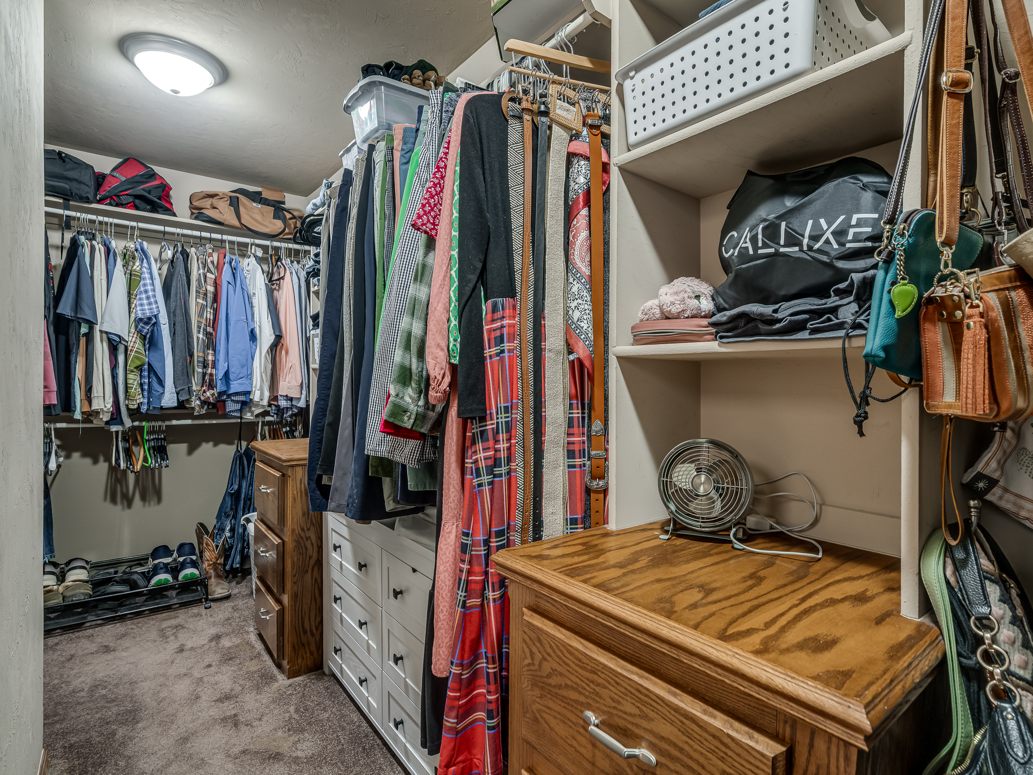 Walk Around Closet with Built-Ins for His side & Her Side