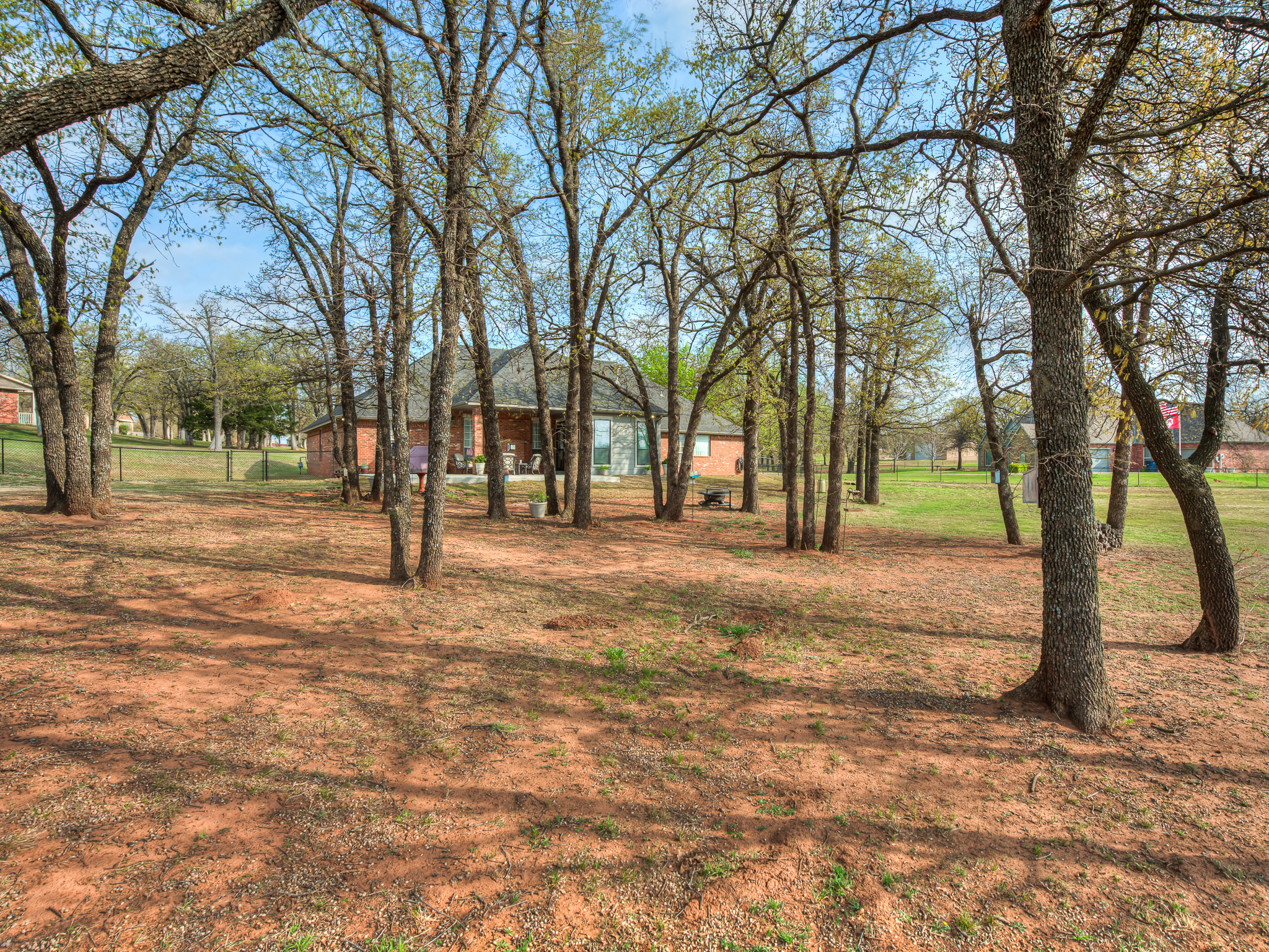 View of the Back Patio through the Blackjack Trees
