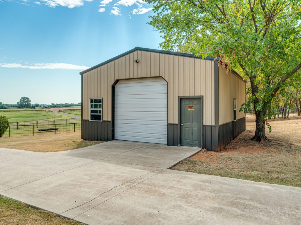 24X30 Wood Framed Metal Shop construction with Concrete Floor, 220 Electric and a 30 amp RV Service.