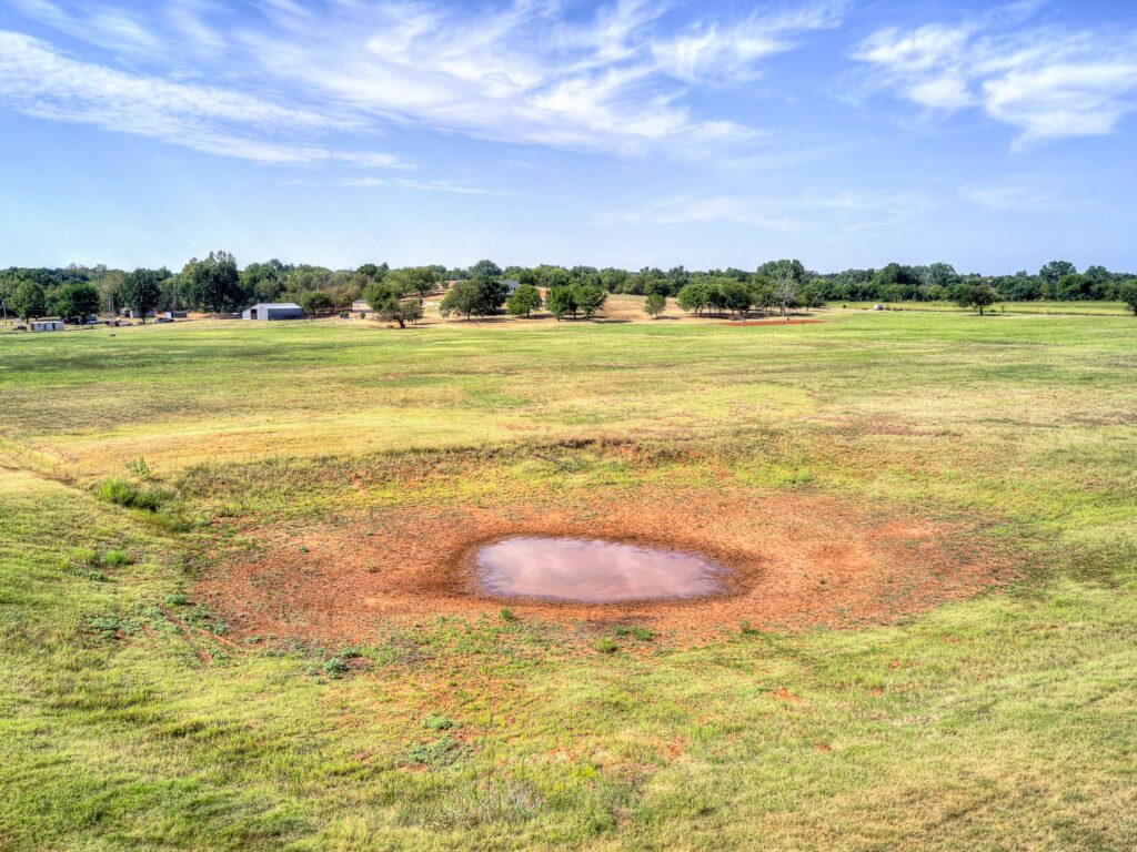 Man Made water Hole in the Northeast Corner of Pasture... if it ever rains again!